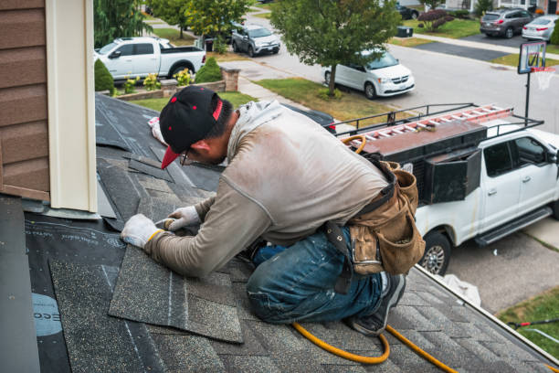 Professional Gutter Installation technician working in Pentwater, MI